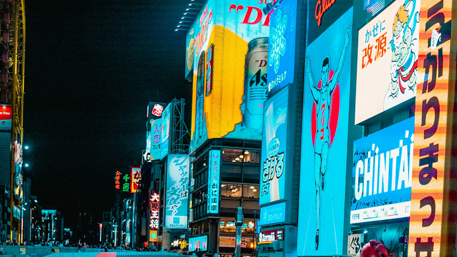 The Glico running man sign among the neon billboards of Dotonbori, Osaka